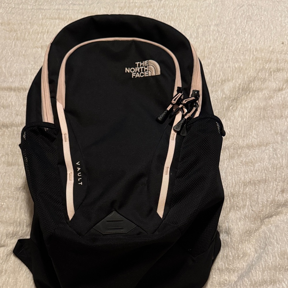 The North Face Black and Cream Backpack
